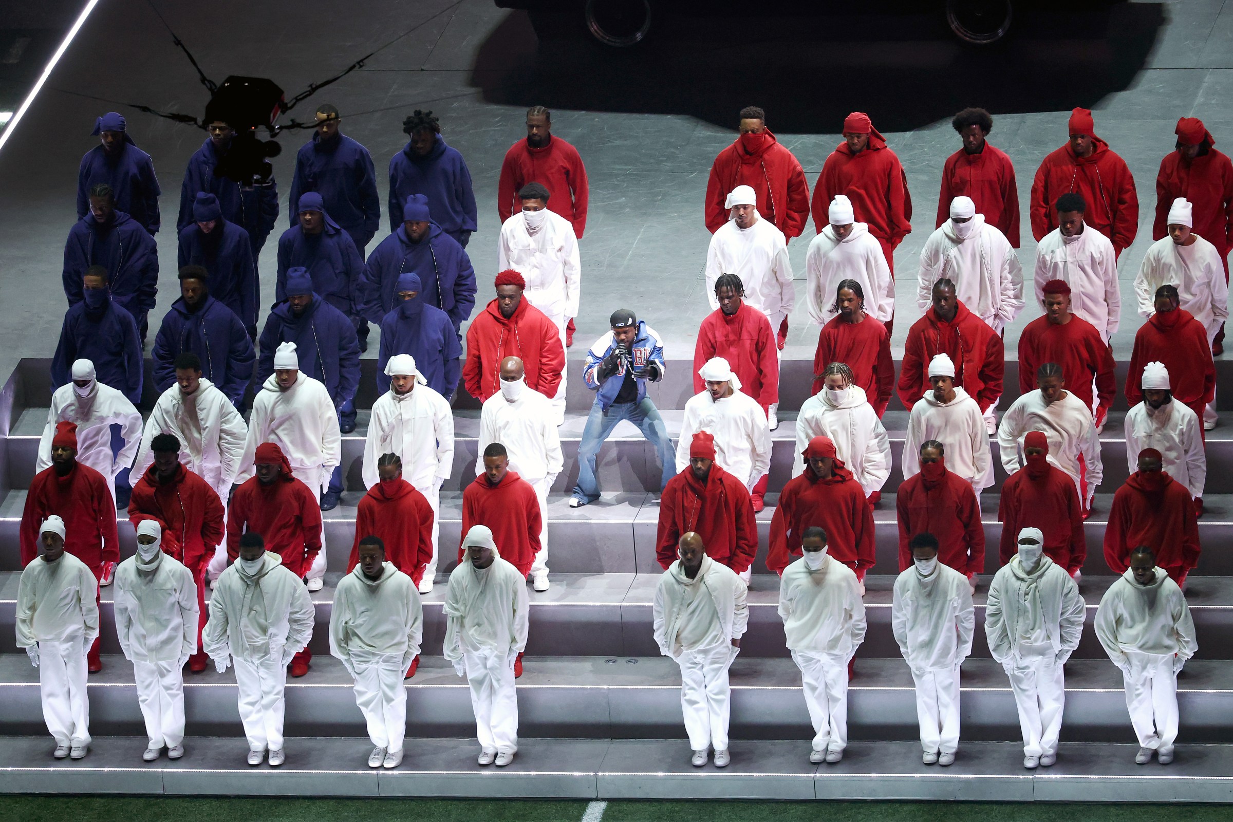 Rapper Kendrick Lamar performs onstage with backup dancers during Apple Music Super Bowl LIX Halftime Show at Caesars Superdome on February 09, 2025 in New Orleans, Louisiana. 